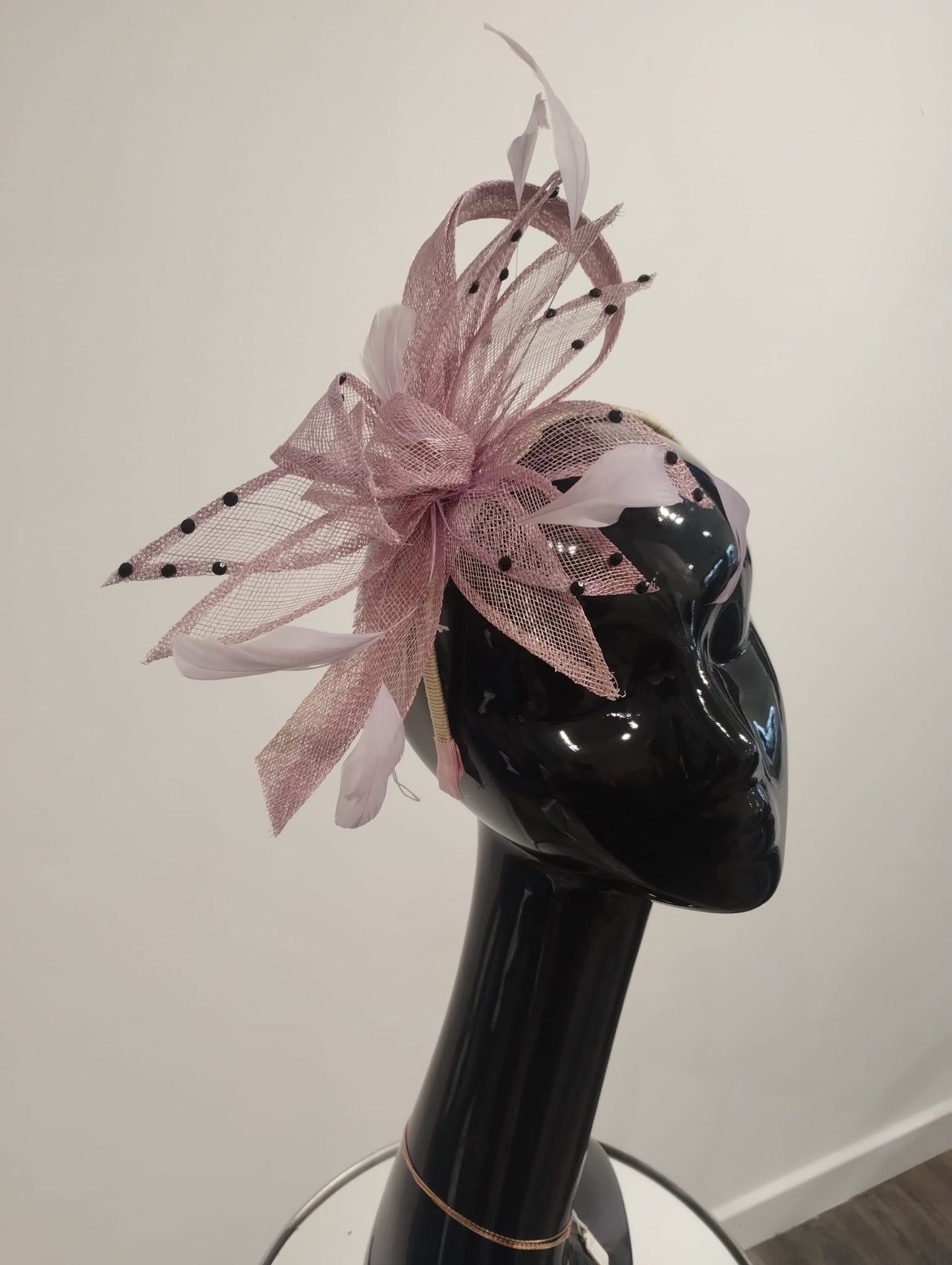Bow and feathered band