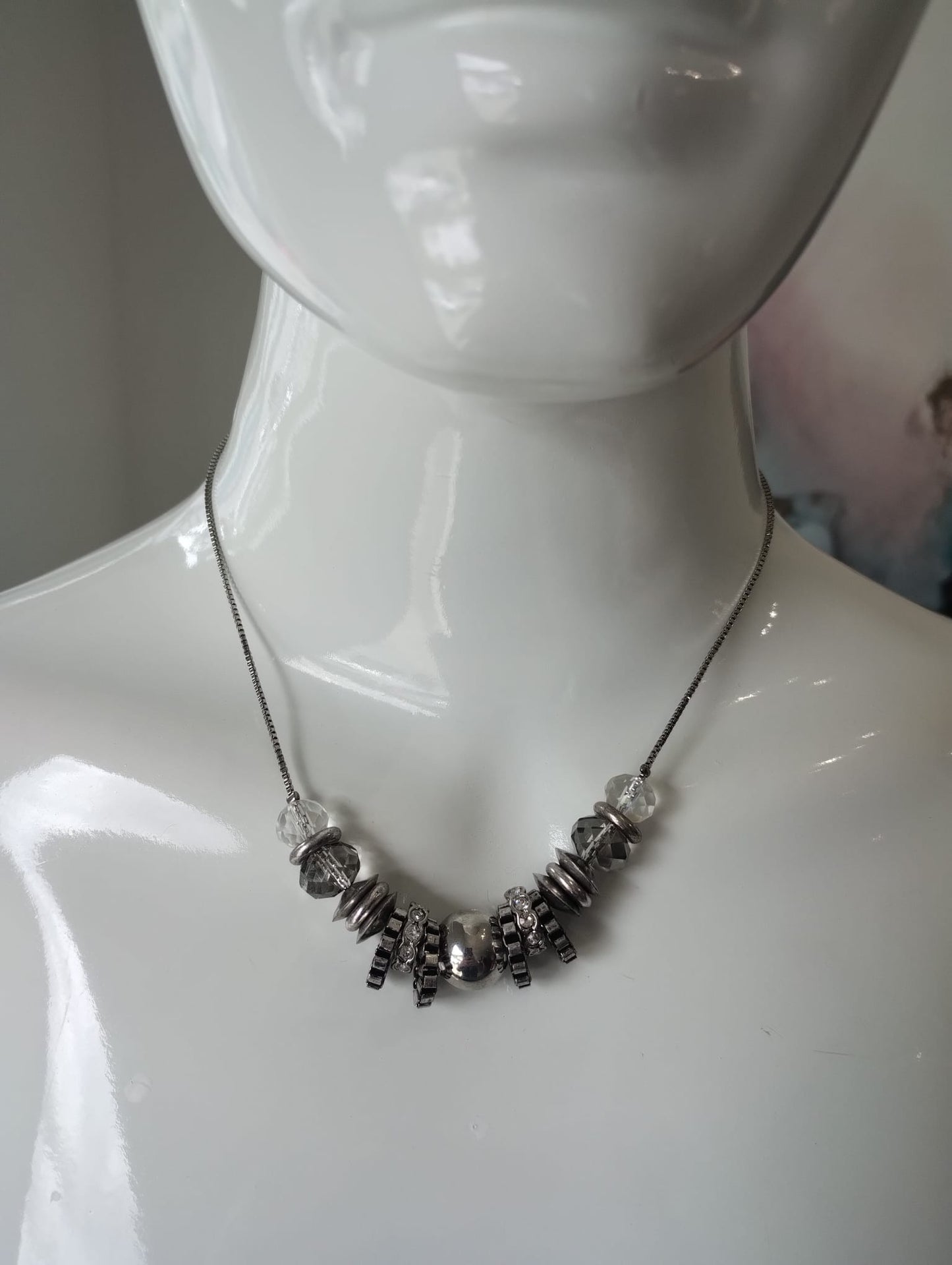 Silver coloured necklace