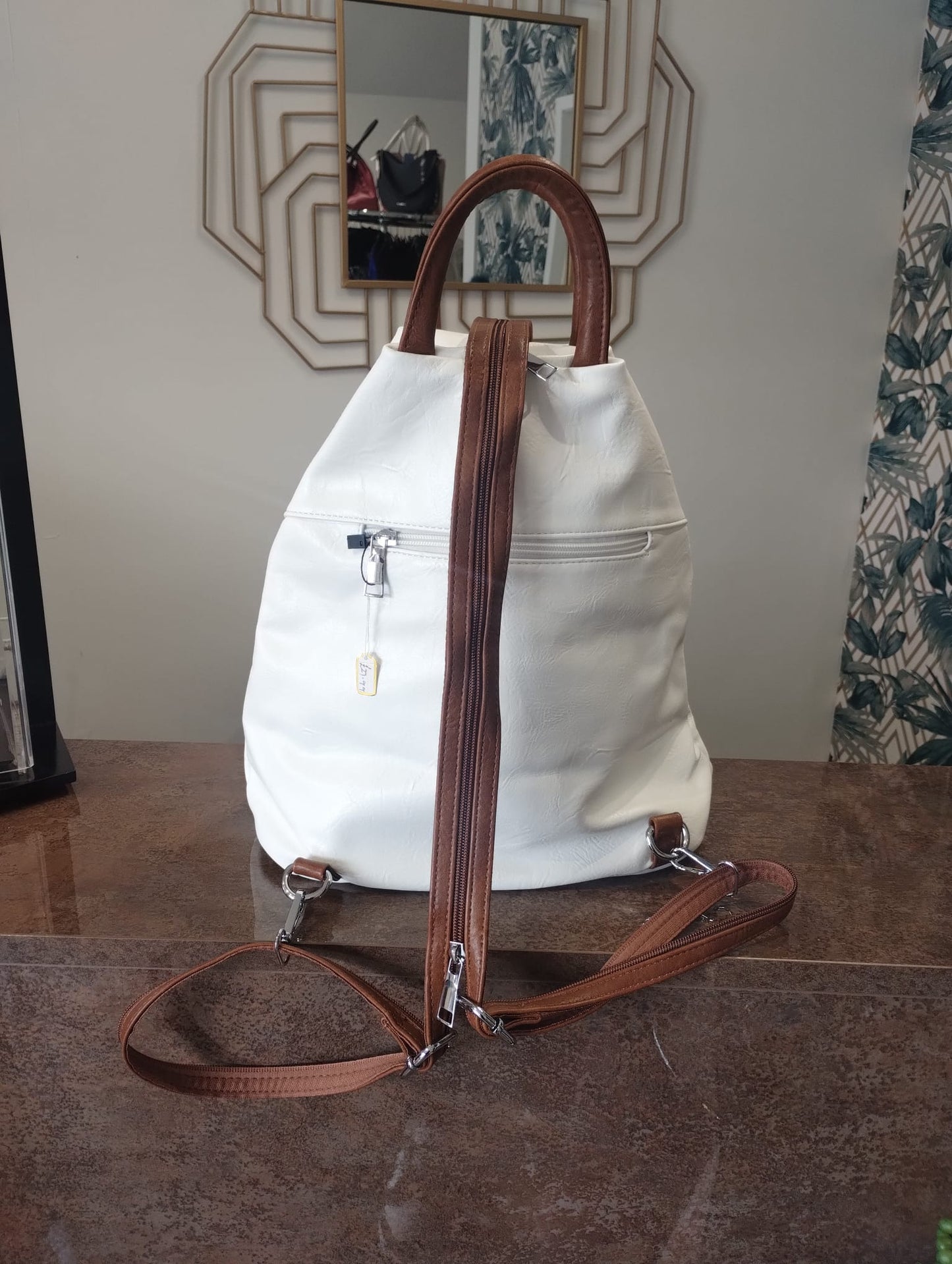 White and brown back pack