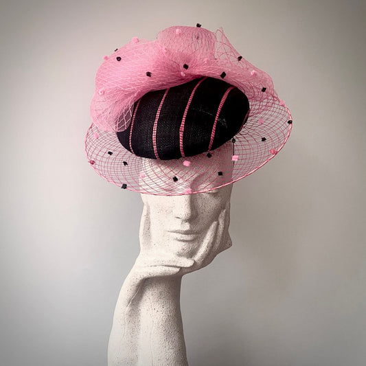 Saucer head dress