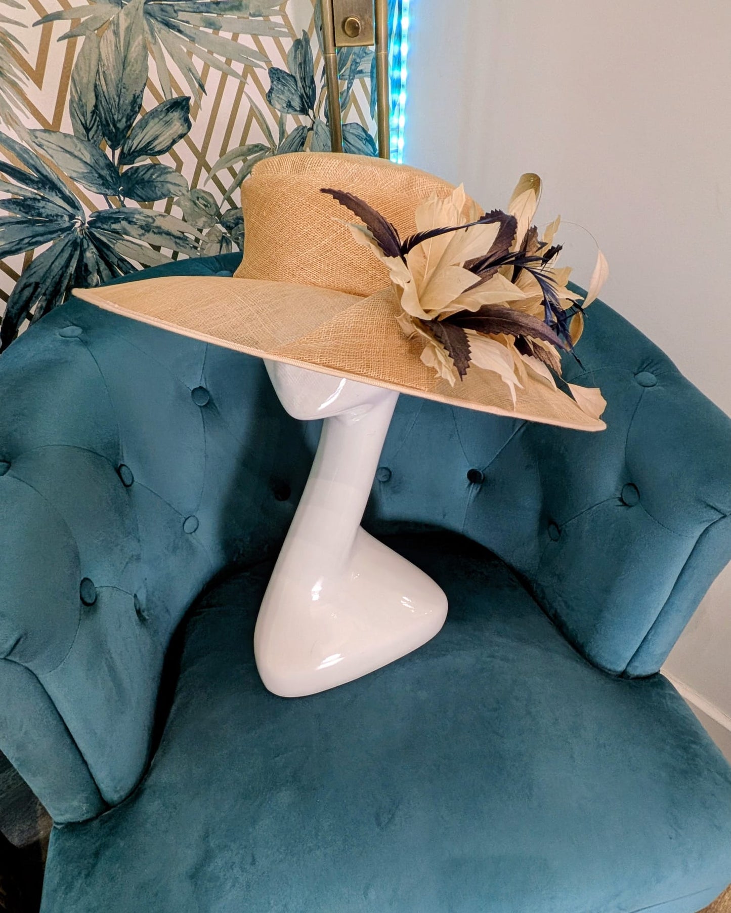 Beige hat with arrangement