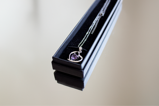 Silver necklace, heart shaped with purple stone